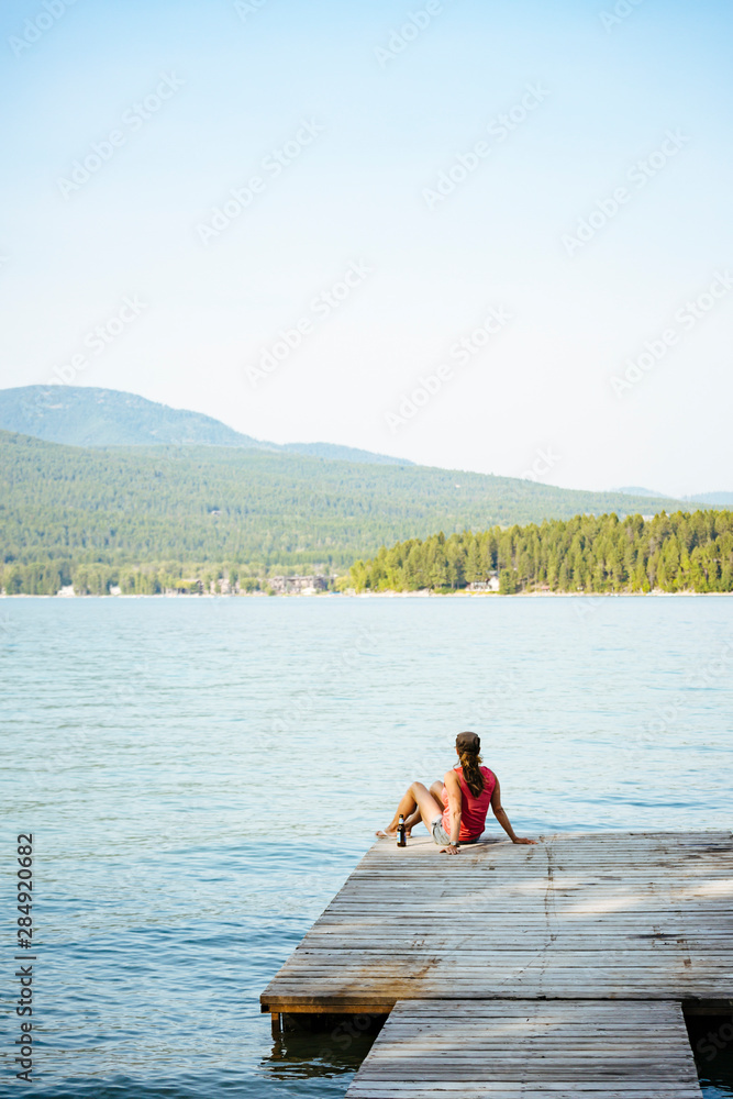 A woman at Whitefish Lake, Whitefish, Glacier Country, Montana, USA. A woman at Whitefish Lake, Whitefish, Glacier Country, Montana, USA.