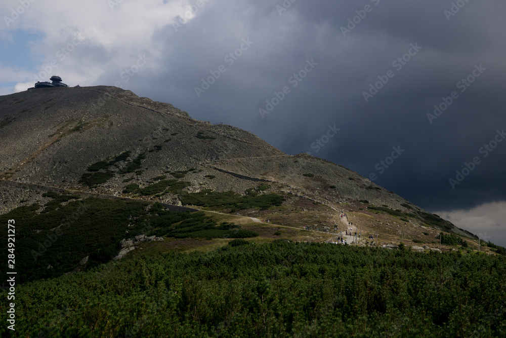 Mountain Śniezka in the Karkonosze / Krkonose/Giant MOuntains insummer with stormy clouds