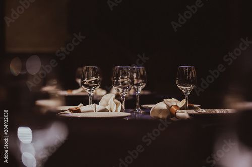 Empty glasses set in restaurant photo