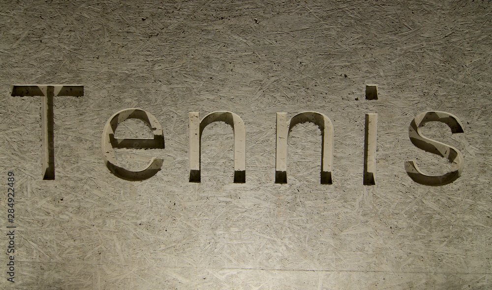 Tennis inscription engraved in stone Tennis inscription engraved in stone