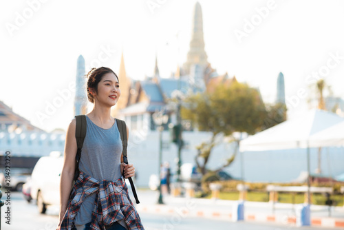 Photography Traveler Asian woman traveling and walking in Bangkok, Thailand, backpacker female feeling happy spending relax time in holiday trip