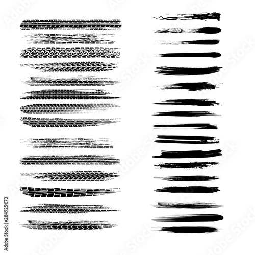 Set of different black tire tracks and brushes isolated on white background