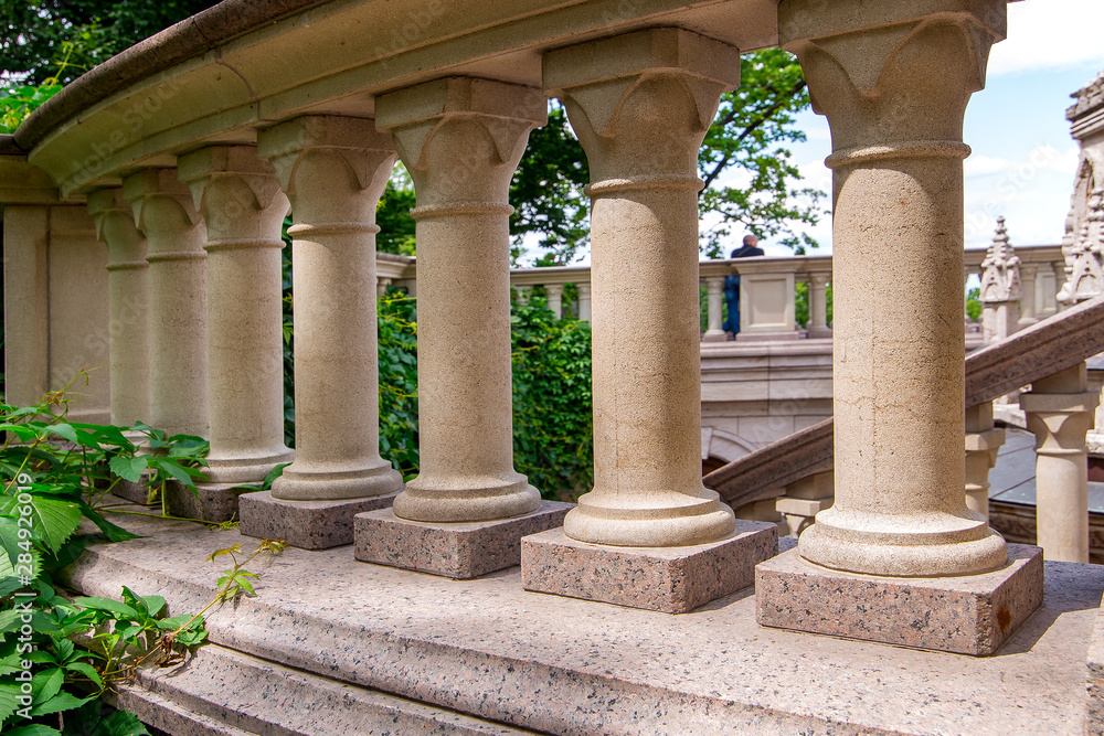stone balustrades of the balcony, a close up of architectural elements.