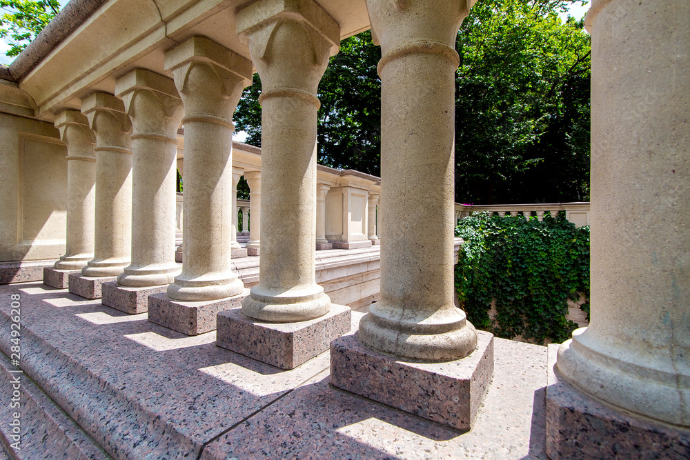 Balustrades of an architectural structure made of stone in the Baroque style close up.