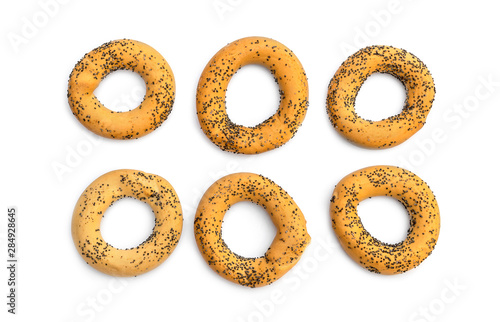Drying round bagels on white. Top view.