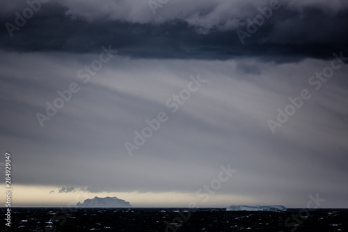 Storm clouds over Newcomb Bay, Antarctica. photo