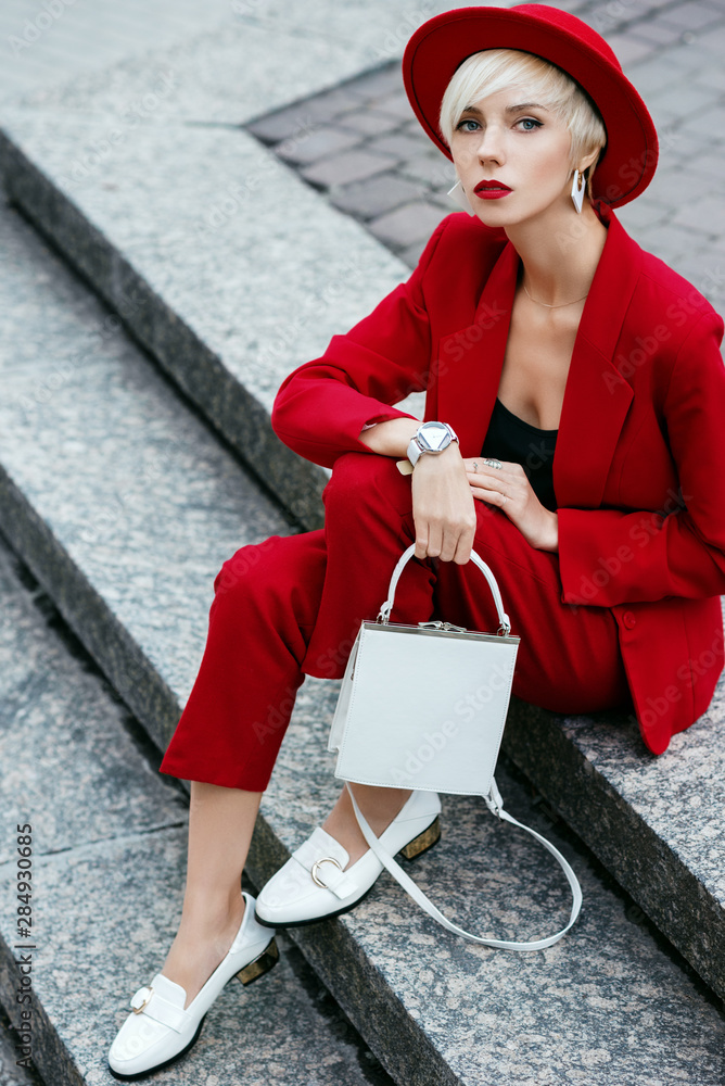 White suit sales red shoes