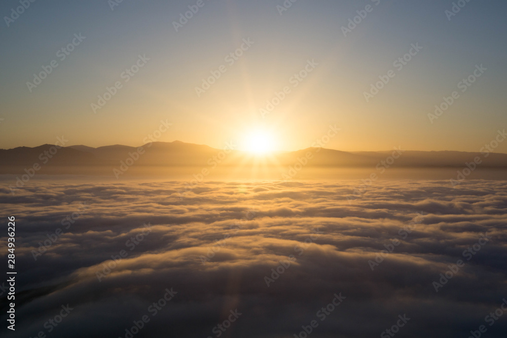 sunrise in the mountains and clouds
