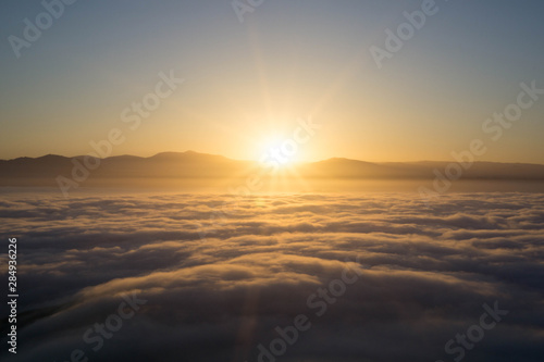 sunrise in the mountains and clouds