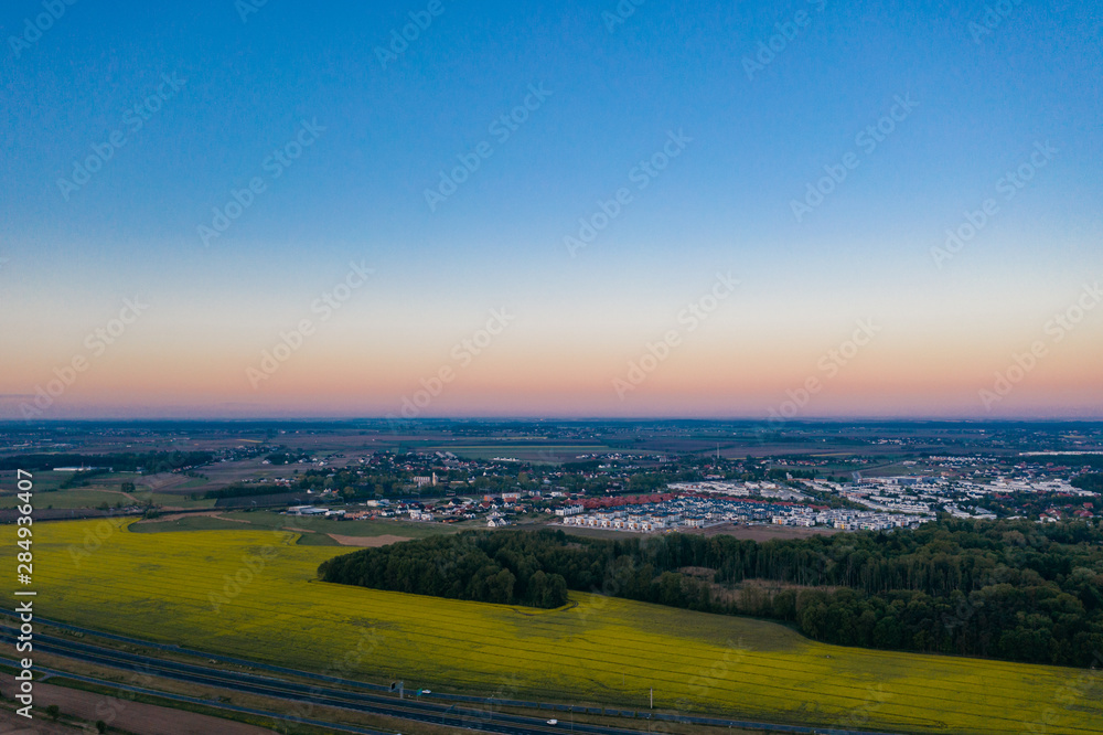 Aerial drone photography of the city suburbs, highway around the main city. 