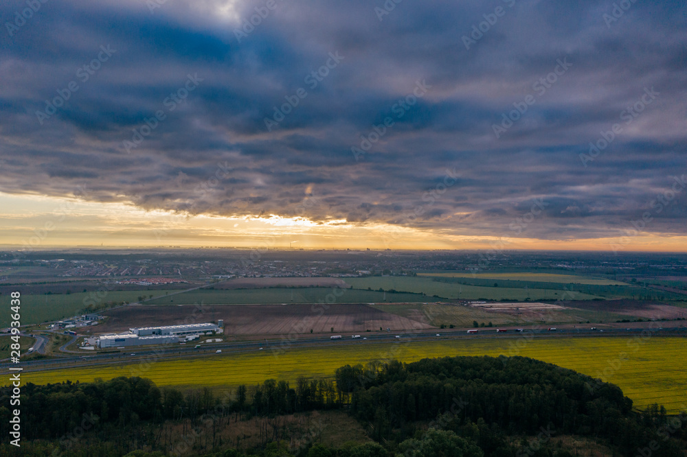 Fototapeta premium Aerial drone photography of the city suburbs, highway around the main city.