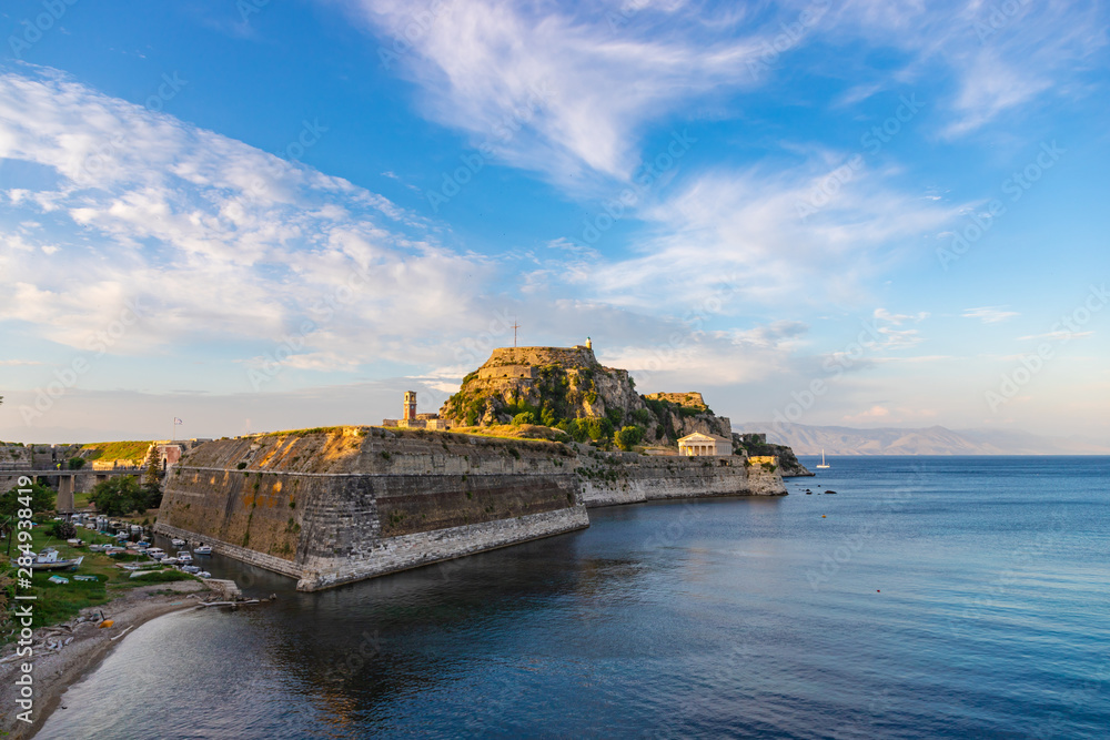 Old fortress in Kerkyra (Corfu town) at sunset. Corfu island, Greece.