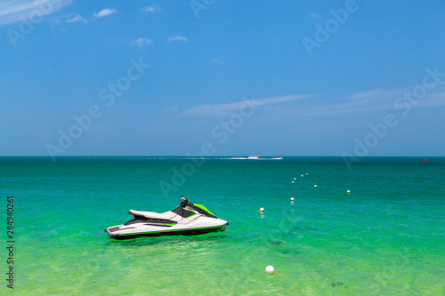 Turquoise ocean jet ski scooter blue sea