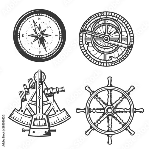 Marine navigation compass, ship helm and sextant photo