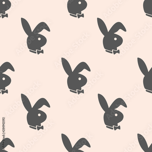 Seamless two-color flat gray gray rabbit pattern on a light pink background, and connected to each other on the left, right, up, down.