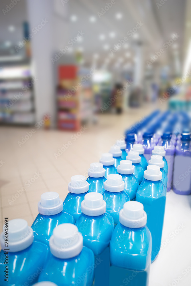 bottles in a row at the supermarket bottles in a row at the supermarket
