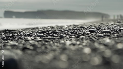 Large Black Volcanic Rocks by the Sea photo
