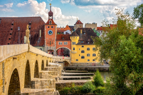 Die Altstadt von Regensburg mit der Steinernen Brücke im Vordergrund photo
