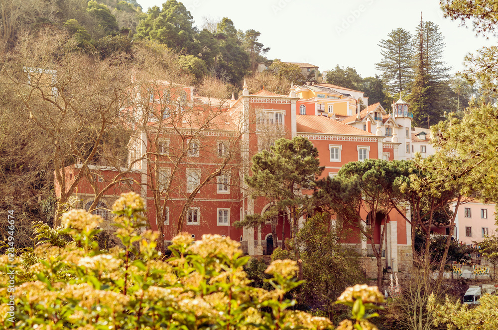 A medieval mansion surrounded by green forest in Sintra (Lisbon, Portugal)