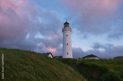 Historical Hirtshals lighthouse on the coast of Skagerrak at sunset, Denmark(Danmark). July 2019