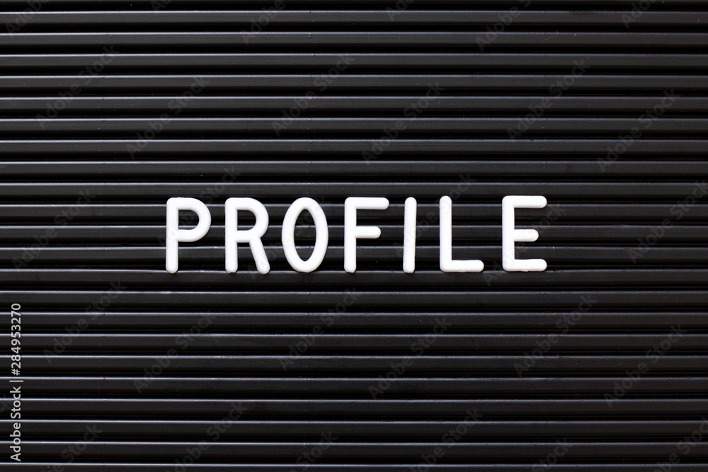 Black color felt letter board with white alphabet in word profile background Black color felt letter board with white alphabet in word profile background