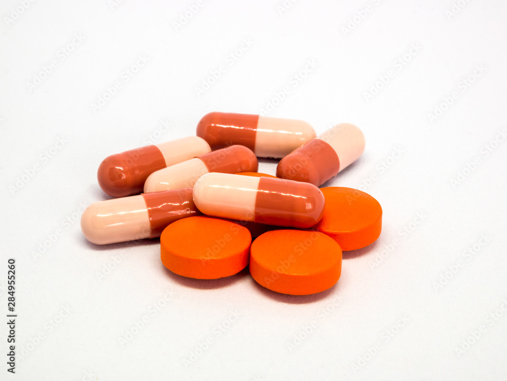 Tablets and pills on a white background Tablets and pills on a white background