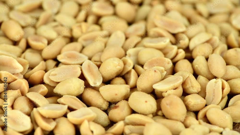 Rotating roasted and salted Peanuts (seamless looapble) in 4K UHD Rotating roasted and salted Peanuts (seamless looapble) in 4K UHD