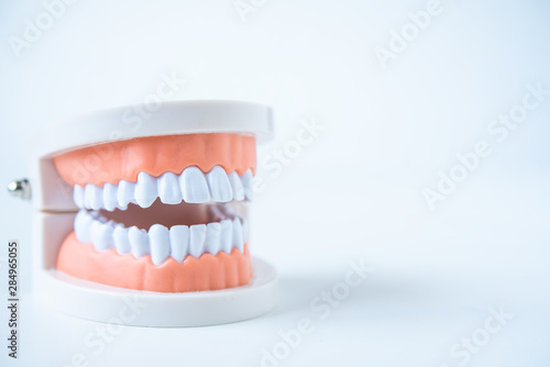  close up dentist tools for teeth care at white background top view
