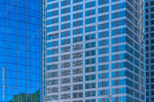 Glass facade of outdoor blue skyscraper