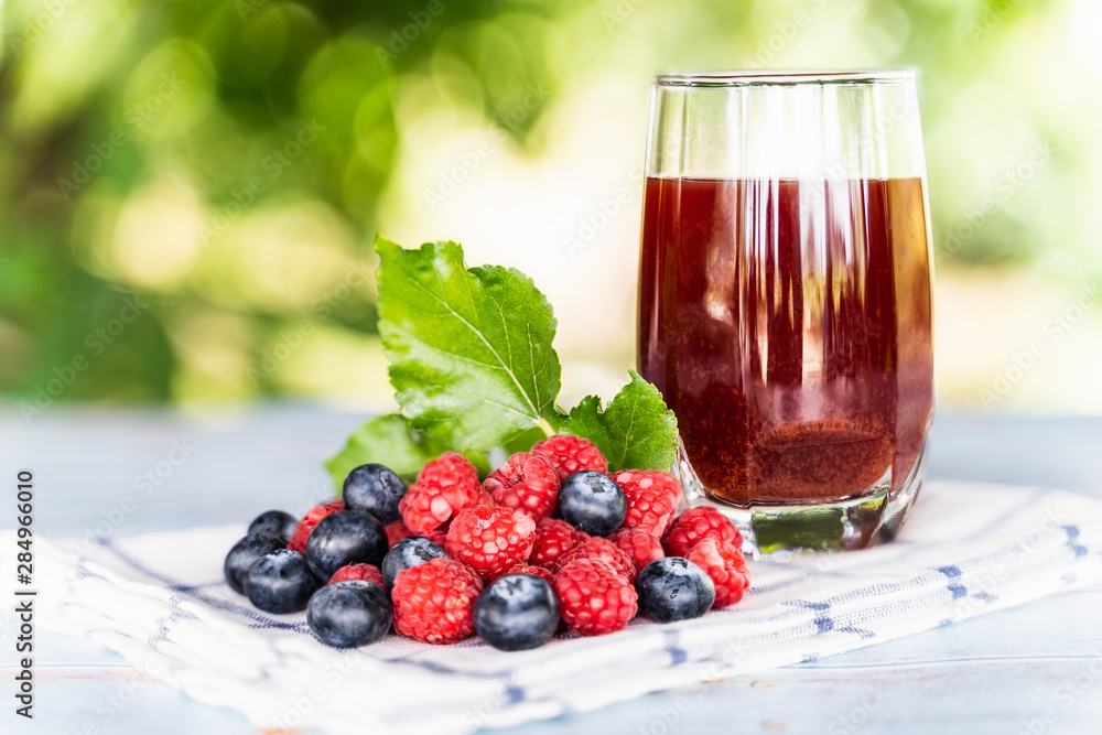 Fresh mixing for blueberry and raspberries juice with bokeh background. Fresh mixing for blueberry and raspberries juice with bokeh background.