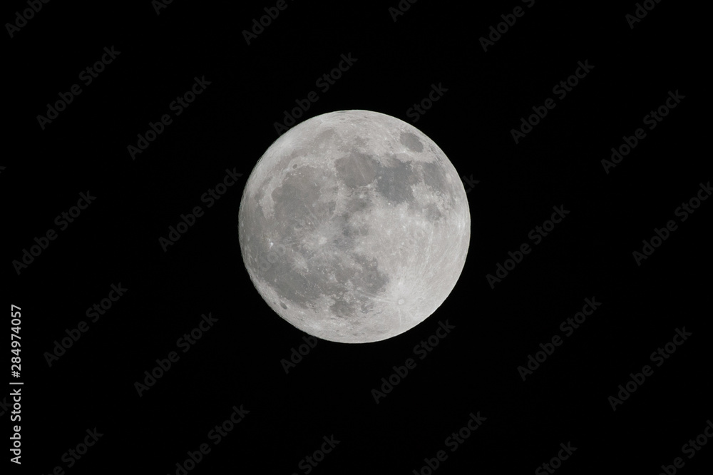Obraz premium Full moon in Thailand on a dark night sky cleared of clouds isolated