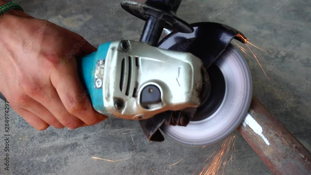 Sparks Fly From Industrial Grinder Sparks Fly From Industrial Grinder