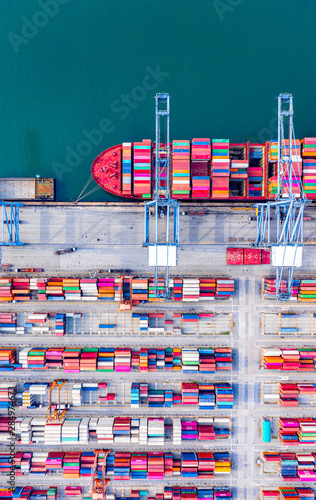 Top view of Deep water port with cargo ship and containers. It is an import and export cargo port where is a part of shipping dock and export products worldwide