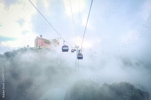 Cable car to Ba Na Hills Mountain Resort among fog. The longest non-stop single track cable car is 5,801meter, Da Nang, Vietnam.