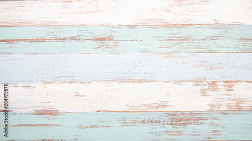Close up of wall made of painted pastel colored wood planks, Old wooden texture background