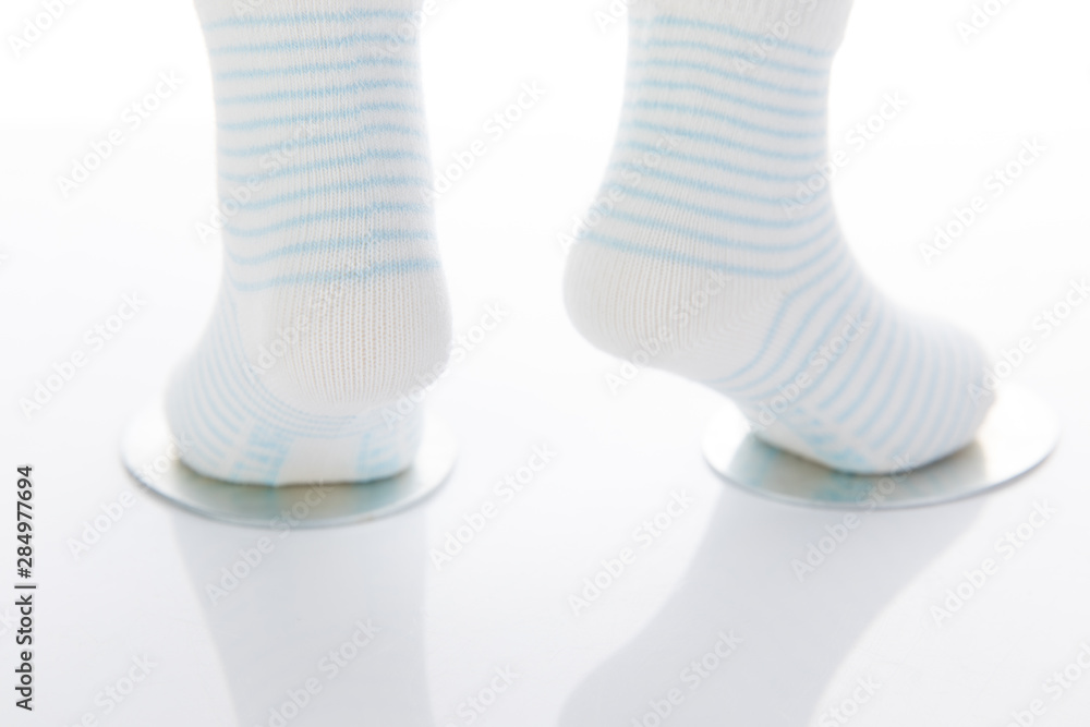 Exquisite and fashionable socks are displayed on the counter of the shop.