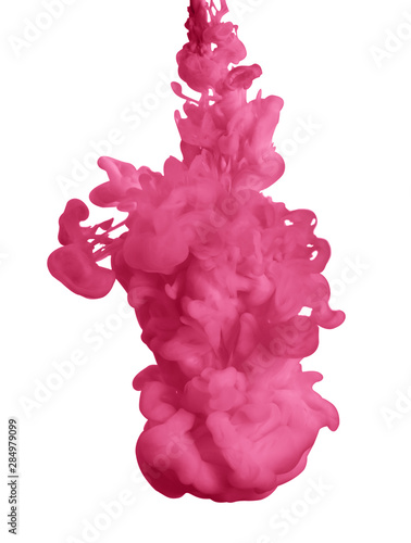 Splash of pink ink on white background