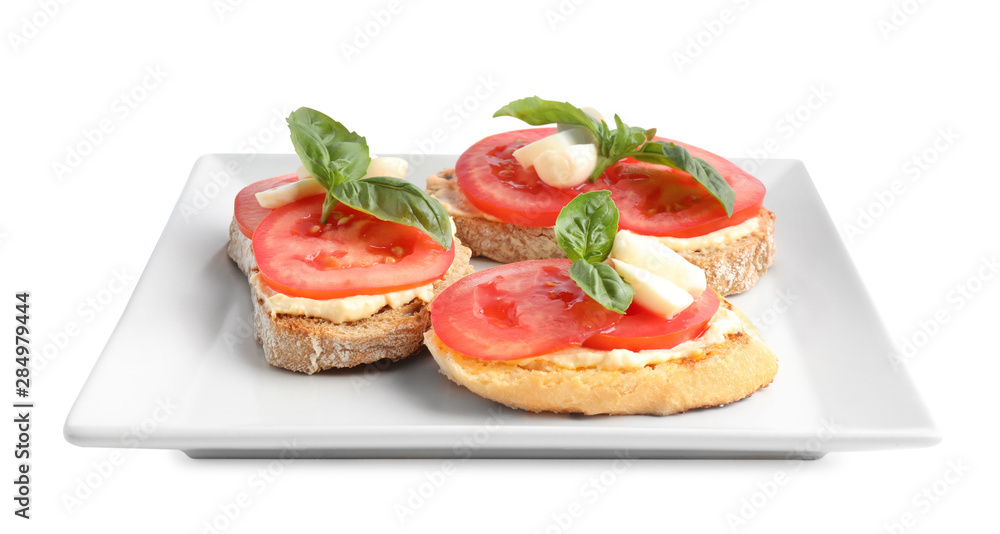 Tasty fresh tomato bruschettas on white background Tasty fresh tomato bruschettas on white background