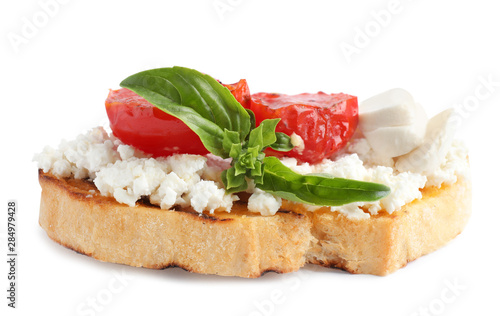 Tasty fresh tomato bruschetta on white background