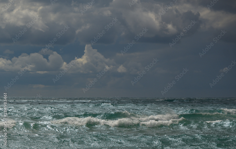 seascape wave beach sand clouds