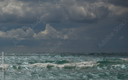 Fototapeta Naklejka Na Ścianę i Meble -  seascape wave beach sand clouds