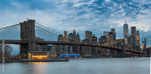 Fototapeta Naklejka Na Ścianę i Meble -  View to New York Manhattan at dusk in colorful impression