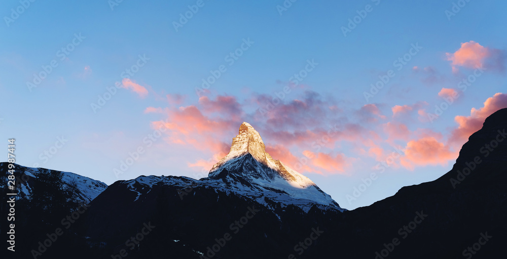 Swiss Alps, Panoramic Matterhorn mountain with sunlight on peak in Switzerland