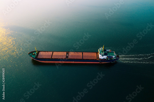 Tableau sur toile Shipping cargo to harbor by ship