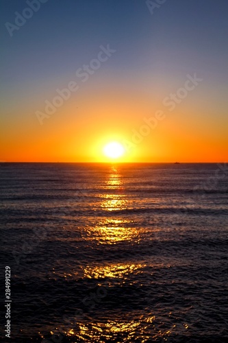 sunset over the sea © Leon