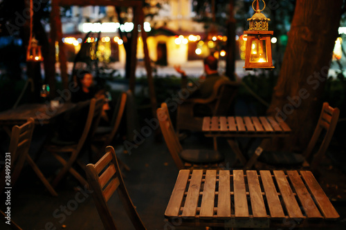 Fotografia Restaurants and bars on evening streets