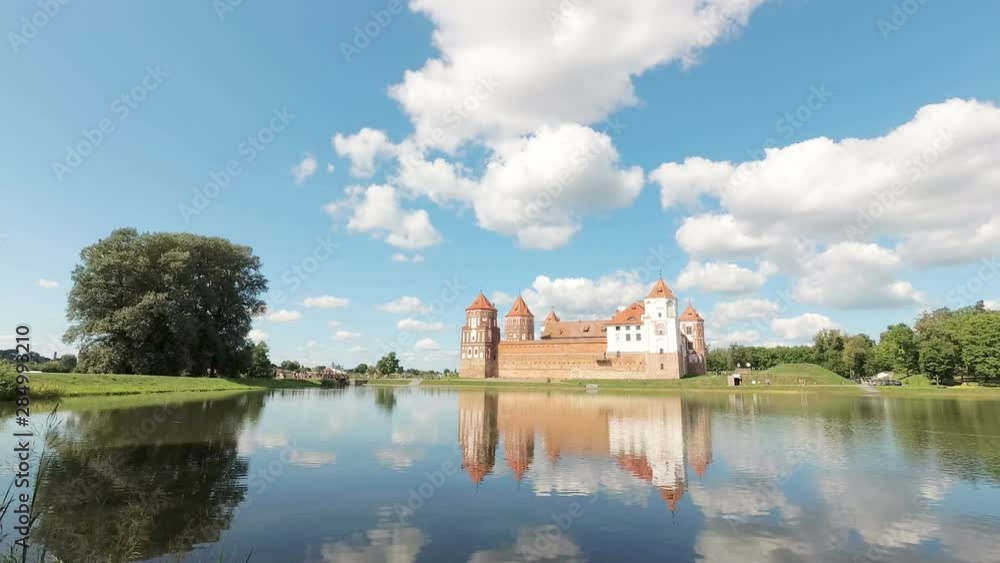 Park complex and castle in the town of Mir. The camcorder rotates from left to right. Belarus. Time lapse. UNESCO world heritage. Park complex and castle in the town of Mir. The camcorder rotates from left to right. Belarus. Time lapse. UNESCO world heritage.