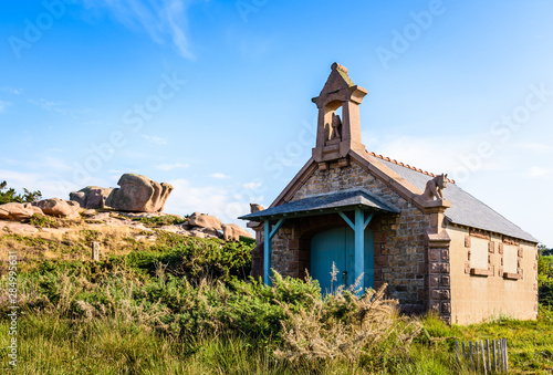 Fototapet The Devil's chapel, with its granite chimeras, is in fact a boathouse on the Pink Granite Coast in northern Brittany, France