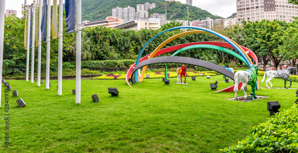 HONG KONG - MAY 5, 2014: City park and skyline. Hong Kong is a special administrative region in the southern China