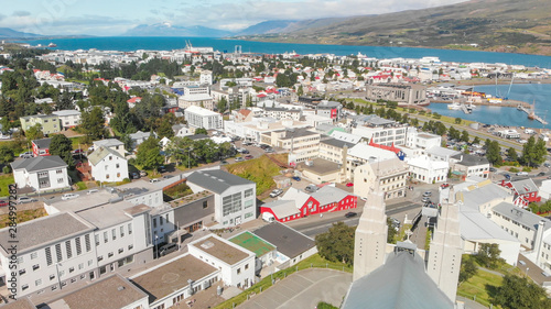 Schilderij op canvas Aerial view of Akureyri town in Iceland on a sunny summer afternoon
